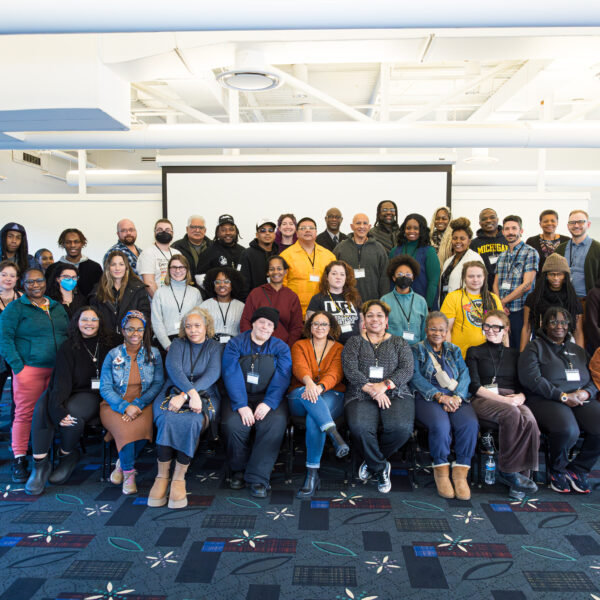 A group photo of the seventy plus attendees at the convening.